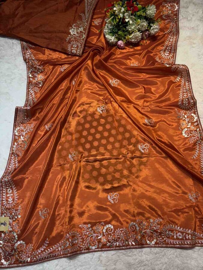 NEELAM TRADERS NEW LAUNCH PITHON WORK SAREE IN SOFT SILK FABRIC RUST ORANGE