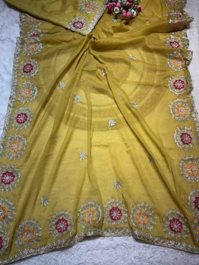 NEELAM TRADERS NEW LAUNCH KASIDA WORK SAREE WITH COLOUR THREAD WORK IN SOFT GEORGETTE FABRIC YELLOW