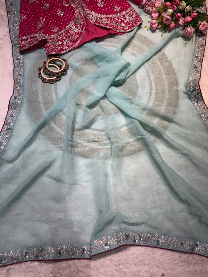 NEELAM TRADERS NEW LAUNCH TRENDING BANDHEJ MOTHDA STITCHED BLOUSE WITH TRENDING KASAB WORK SAREE IN SOFT SILK FABRIC FIROZI