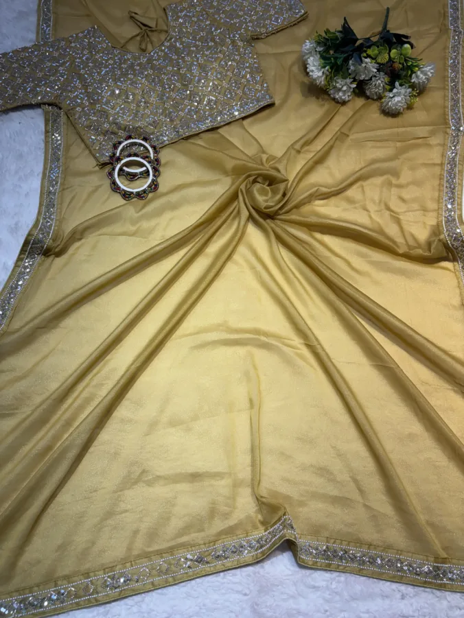 NEELAM TRADERS NEW LAUNCH TRENDING Party wear Stitched blouse saree with hand moti work in soft Georgette fabric YELLOW