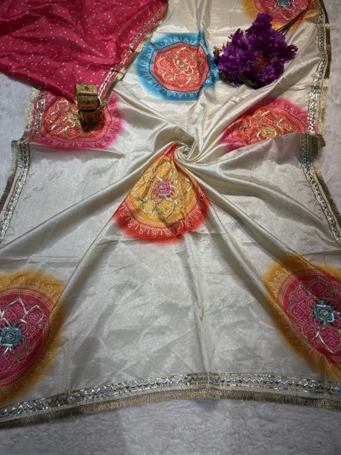 NEELAM TRADERS NEW LAUNCH TRENDING Viral chakra bandhej saree with kacha gota work in single chiku colour