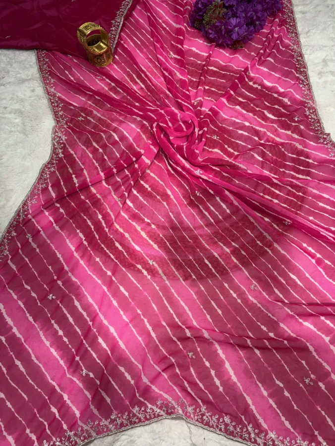 NEELAM TRADERS NEW LAUNCH Laheriya saree with trending pithon work in soft georgette fabric