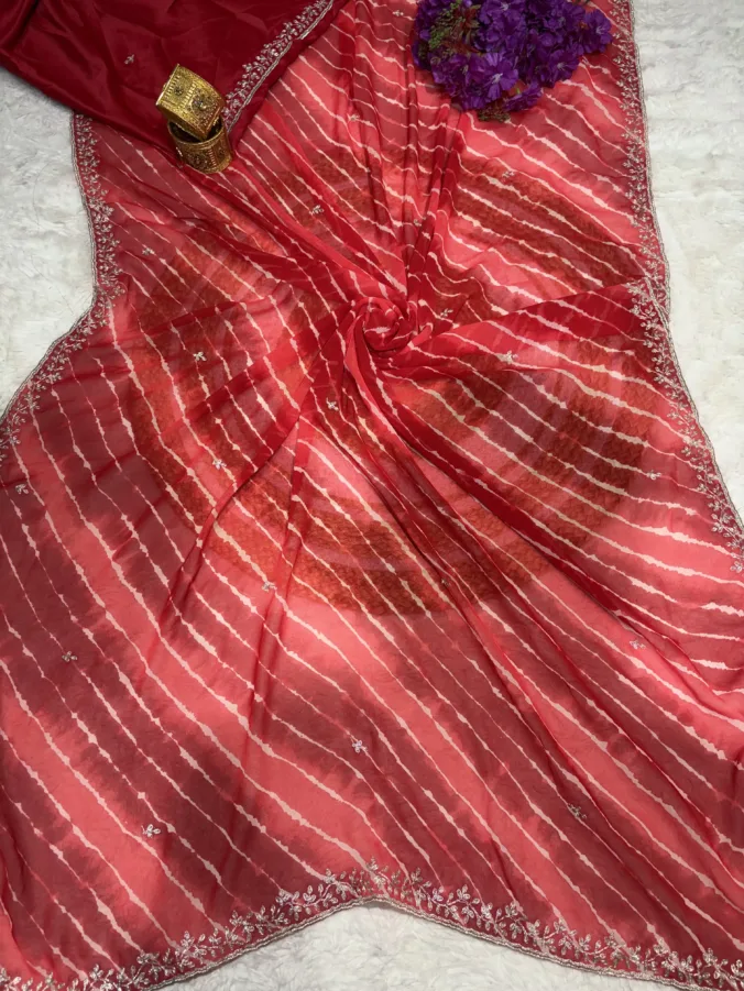 NEELAM TRADERS NEW LAUNCH Laheriya saree with trending pithon work in soft georgette fabric