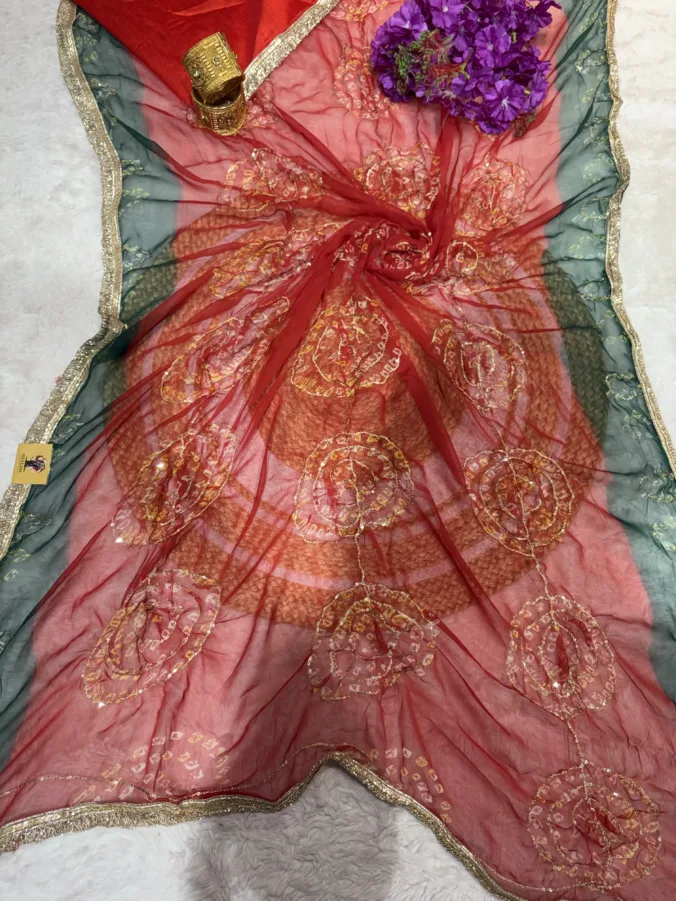 NEELAM TRADERS NEW LAUNCH Trending bandhej saree with thread work and kiran less all over in Chiffon fabric