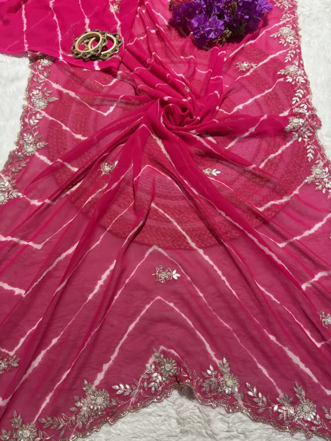 NEELAM TRADERS NEW LAUNCH TRENDING Savan special lehariya saree in Rani color with hand gota patti work all over