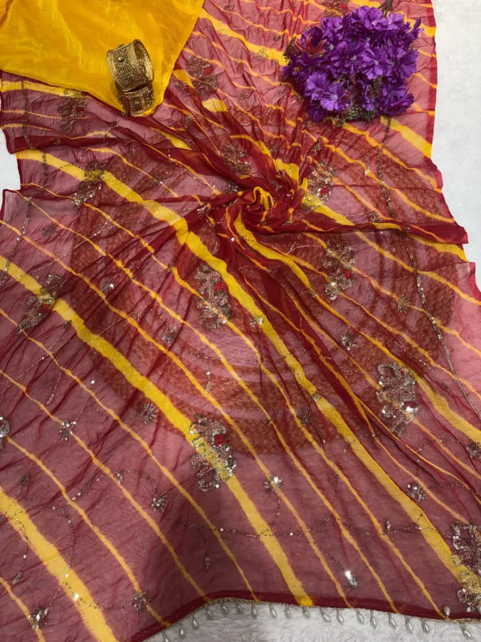 NEELAM TRADERS NEW LAUNCH TRENDING Lehariya saree with pallu moti tussal and hand aari work all over in soft Chiffron fabric