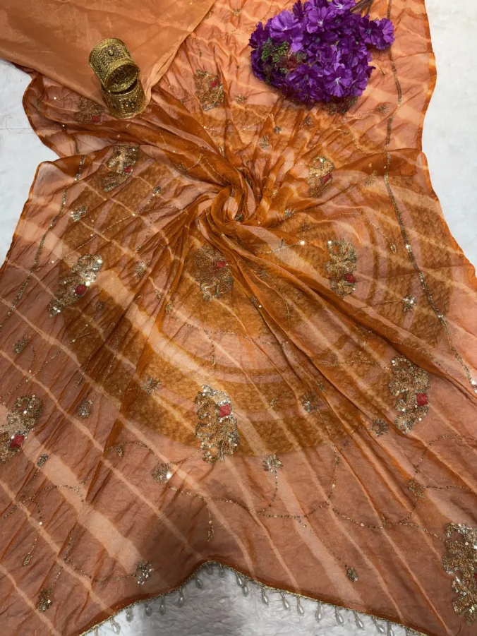 NEELAM TRADERS NEW LAUNCH TRENDING Lehariya saree with pallu moti tussal and hand aari work all over in soft Chiffron fabric