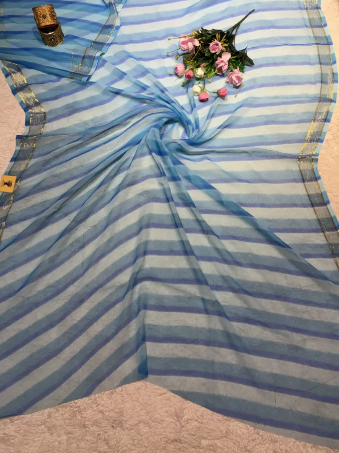 NEELAM TRADERS NEW LAUNCH TRENDING Lehariya saree for regular wear in soft Ciffon fabric with zari Viewing Border all all over
