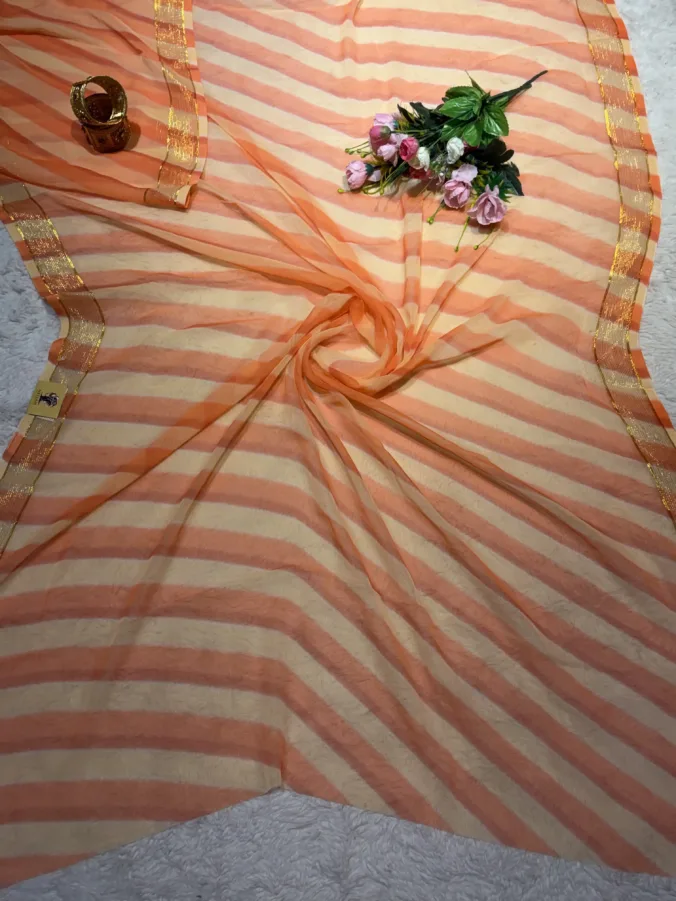 NEELAM TRADERS NEW LAUNCH TRENDING Lehariya saree for regular wear in soft Ciffon fabric with zari Viewing Border all all over