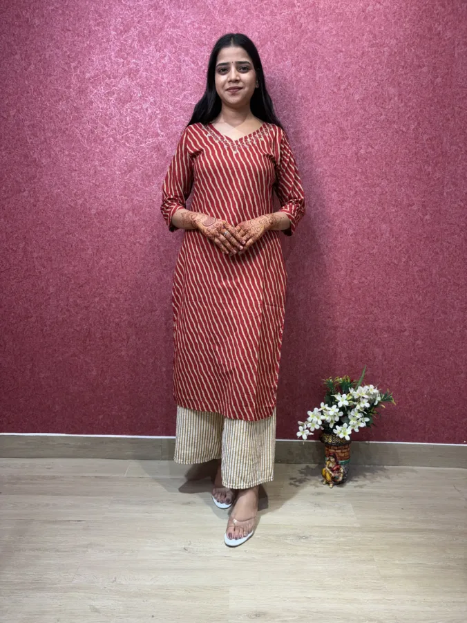 Stylish Leheriya Kurti with Elegant Neck Design and Gracefully Crafted Traditional Silhouette.