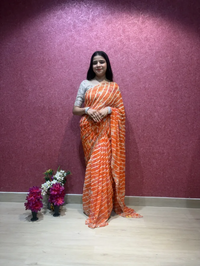 NEELAM TRADERS NEW LAUNCH TRENDING Viral laheriya saree in Single colour concept with hand kardan work all over in soft georgette fabric