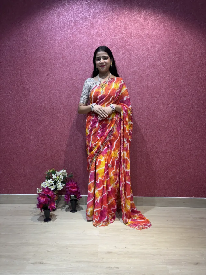NEELAM TRADERS NEW LAUNCH TRENDING zigzak laheriya saree with applic work all over in soft georgette fabric