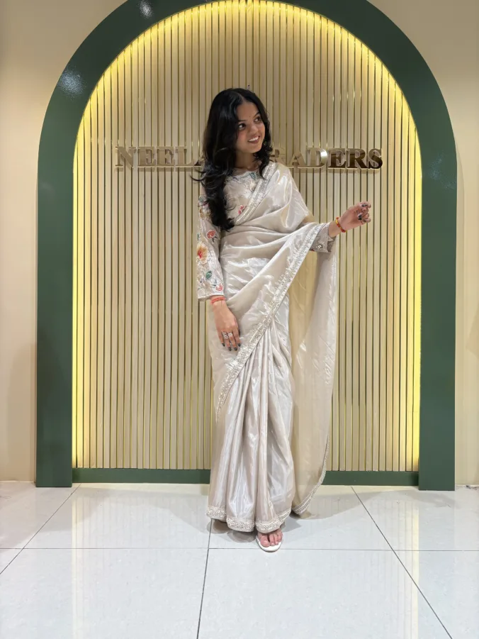 NEELAM TRADERS NEW LAUNCH TRENDING Handwork stitched blouse Partywear saree with trending gray colour with handmoti work border all over in soft silk fabric