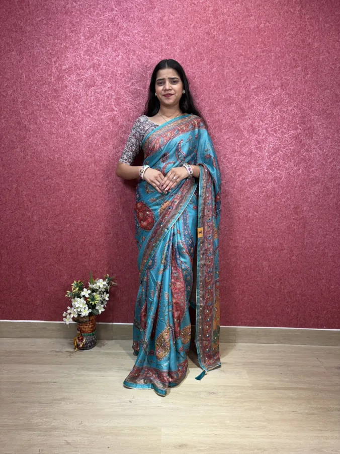 NEELAM TRADERS NEW LAUNCH VIRAL KALAMKARI SAREE WITH TASSALS & MIRROR WORK AT PALLU ALL OVER IN SOFT SILK FABRIC