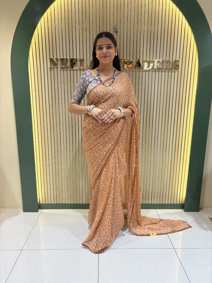 NEELAM TRADERS NEW LAUNCH FLORAL PRINT VIRAL SAREE WITH LITE WEIGHT BORDER ALL OVER IN CHIFFON FABRIC
