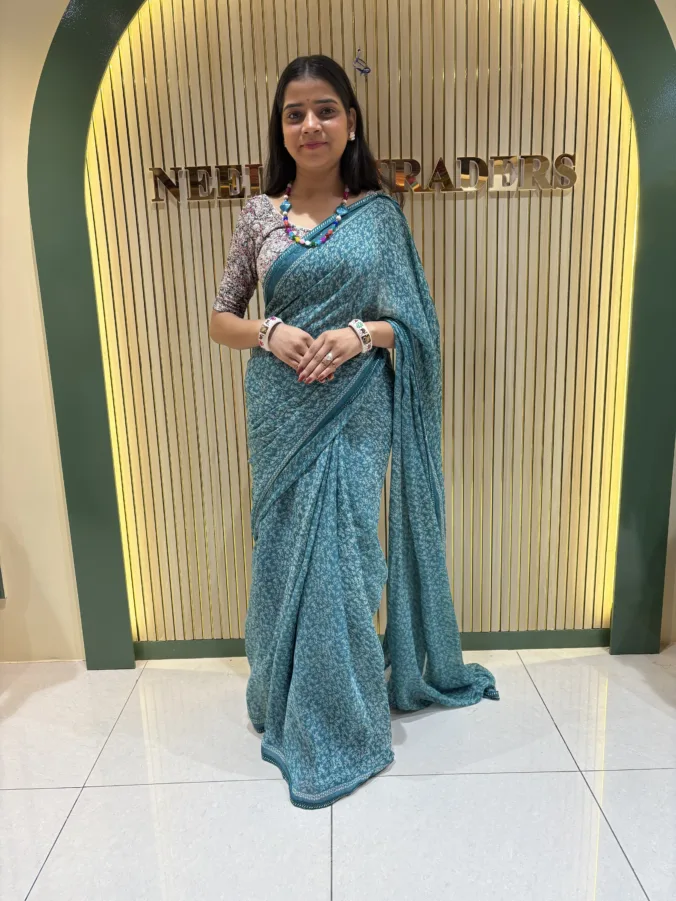 NEELAM TRADERS NEW LAUNCH FLORAL PRINT VIRAL SAREE WITH LITE WEIGHT BORDER ALL OVER IN CHIFFON FABRIC