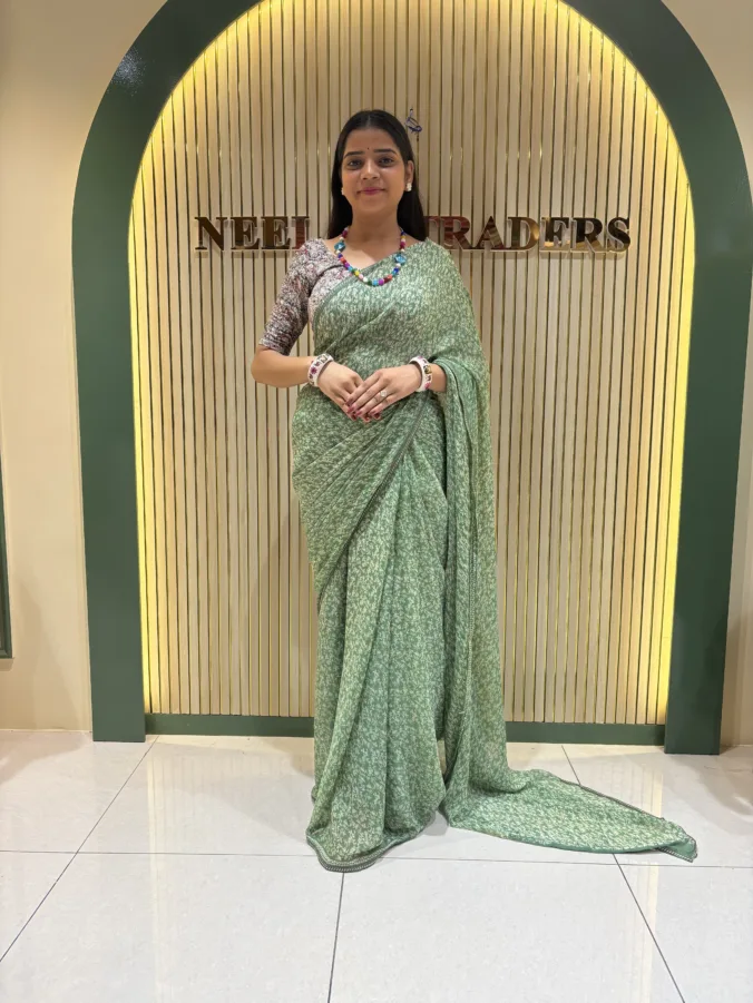 NEELAM TRADERS NEW LAUNCH FLORAL PRINT VIRAL SAREE WITH LITE WEIGHT BORDER ALL OVER IN CHIFFON FABRIC