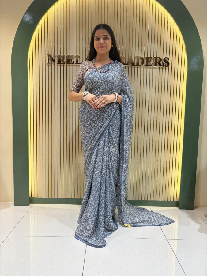 NEELAM TRADERS NEW LAUNCH FLORAL PRINT VIRAL SAREE WITH LITE WEIGHT BORDER ALL OVER IN CHIFFON FABRIC