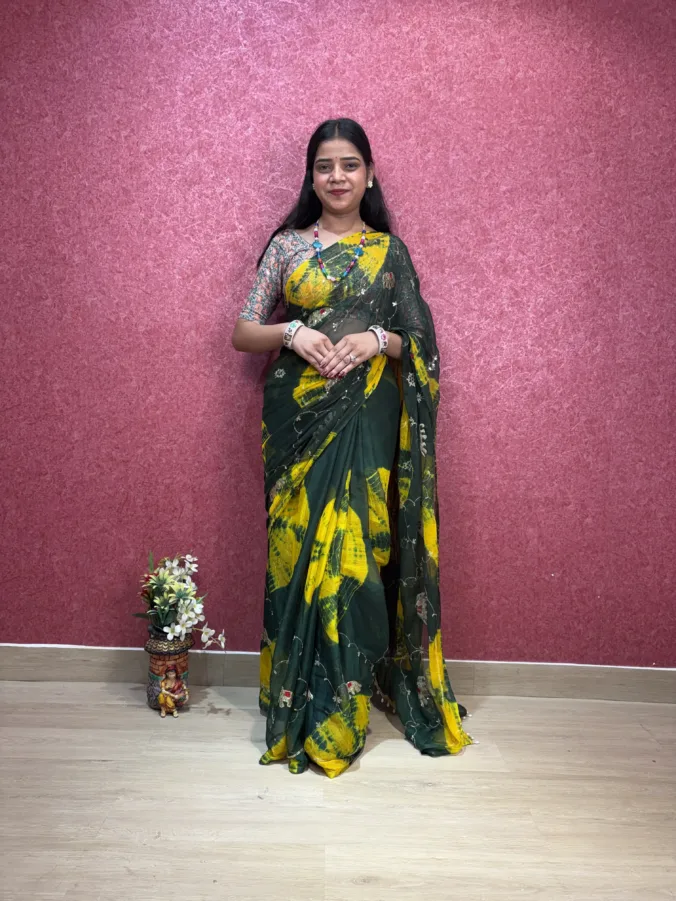 NEELAM TRADERS NEW LAUNCH most viral karwa chauth saree with heavy moti tassals all over in soft simmer chiffon fabric