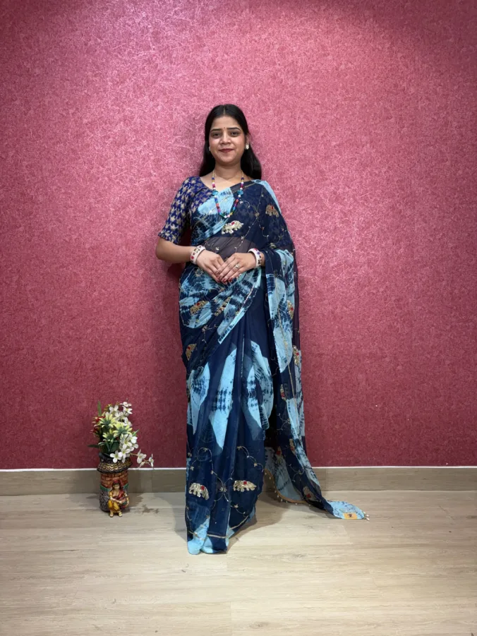NEELAM TRADERS NEW LAUNCH most viral karwa chauth saree with heavy moti tassals all over in soft simmer chiffon fabric