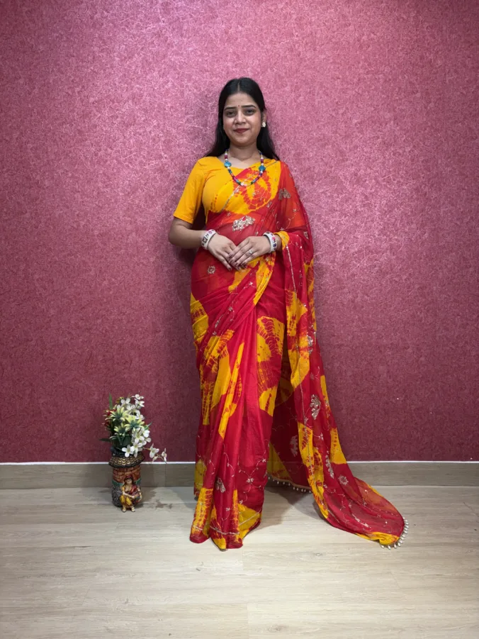 NEELAM TRADERS NEW LAUNCH most viral karwa chauth saree with heavy moti tassals all over in soft simmer chiffon fabric
