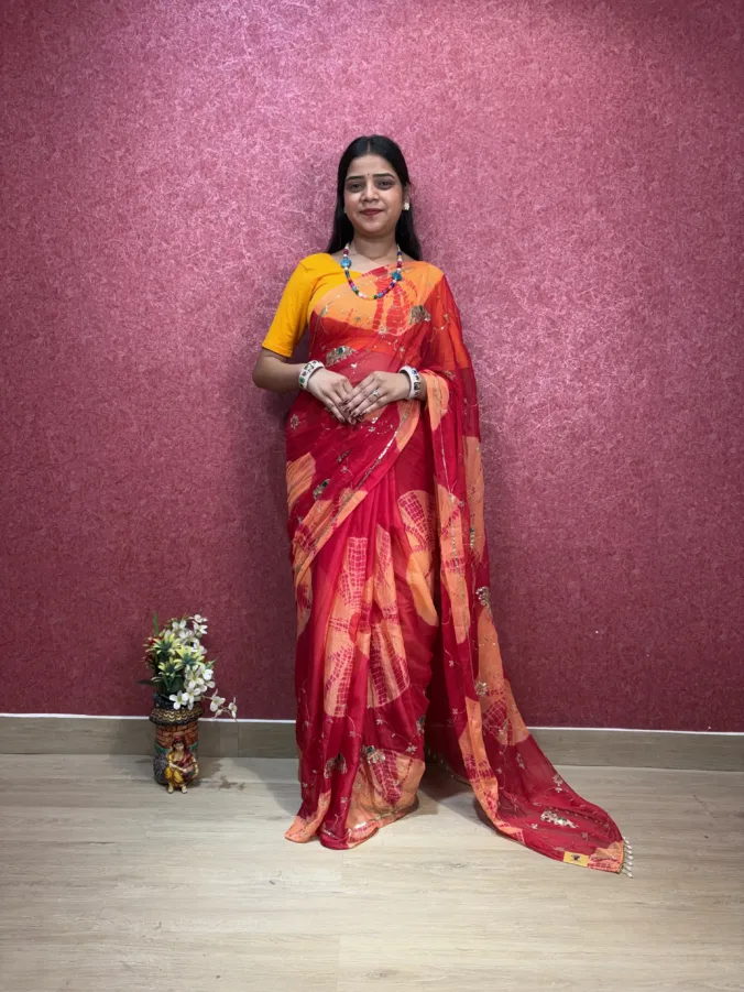 NEELAM TRADERS NEW LAUNCH most viral karwa chauth saree with heavy moti tassals all over in soft simmer chiffon fabric